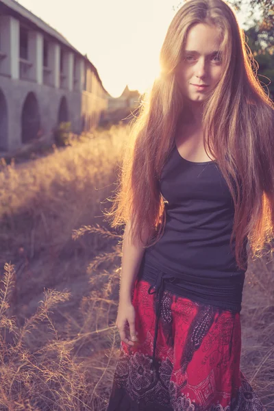 Gold sunset and blond women — Stock Photo, Image