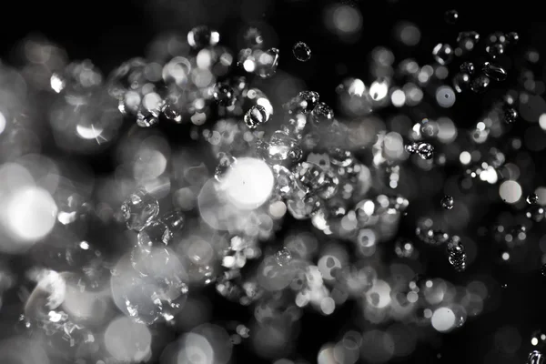 Gotas de agua en el aire — Foto de Stock