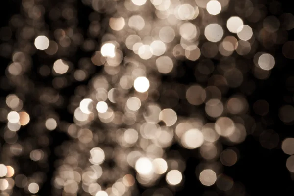 Or Fête de Noël arrière-plan. Elégant fond abstrait avec des lumières et des étoiles bokeh déconcentrées — Photo