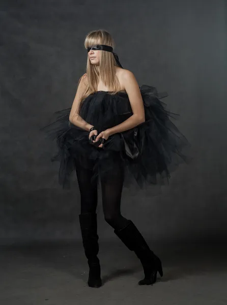 Feminino beleza-retrato com tutu na frente de um fundo escuro — Fotografia de Stock