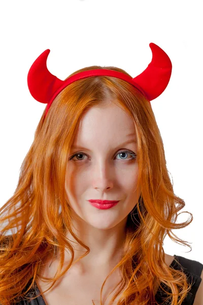 Redhead girl with red horns looks like pretty Devil — Stock Photo, Image