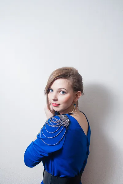 Portrait of a blonde woman weared blue dress — Stock Photo, Image