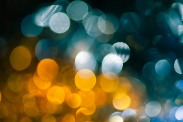 Yellow and blue christmas bokeh for pretty background — Stock Photo, Image