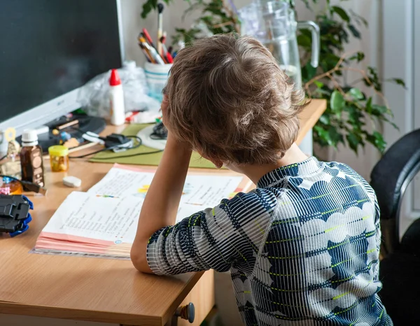 Back view of schoolchildren studying at home — Stock Photo, Image