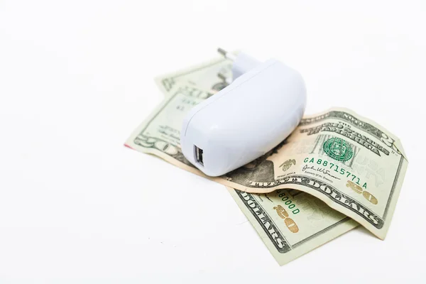 Usb-charger over heap of dollar — Stock Photo, Image