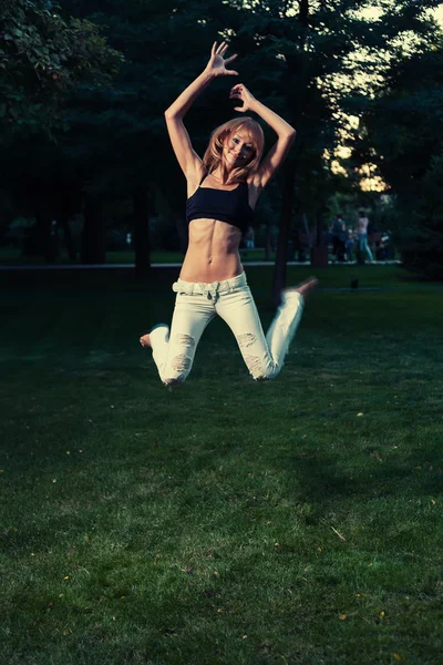 Sporty girl fly — Stock Photo, Image