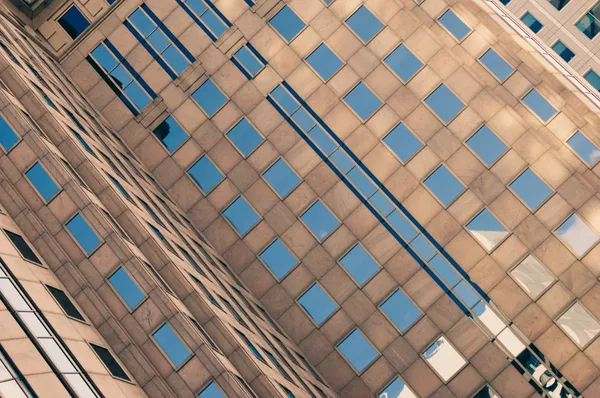 Blue sky reflecting in the windows — Stock Photo, Image