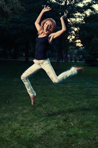 Flying sporty lady — Stock Photo, Image