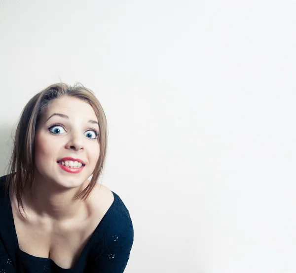 Cute girl looking very surprised — Stock Photo, Image