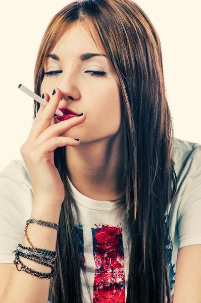Young women with cigarette Royalty Free Stock Photos