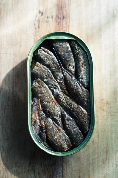 Smoked sprats in a jar — Stock Photo, Image