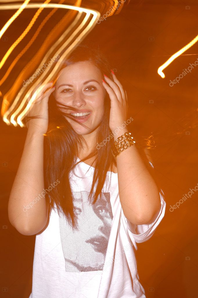 Happy young girl with lightpainting