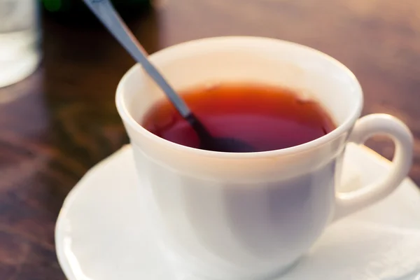 La taza del té sobre la mesa — Foto de Stock