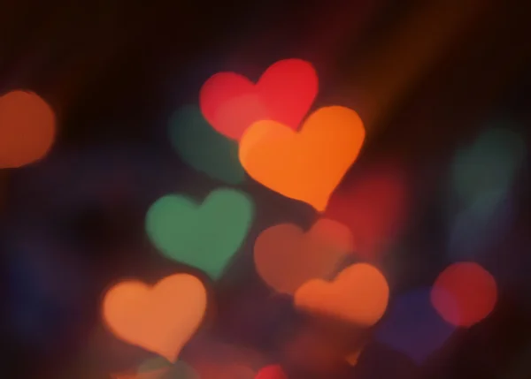 Blurred lights in a shape of hearts — Stock Photo, Image