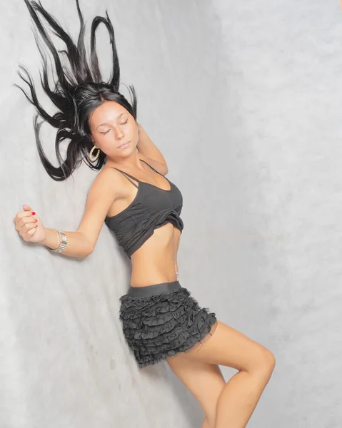 Brunette posing on a floor — Stock Photo, Image