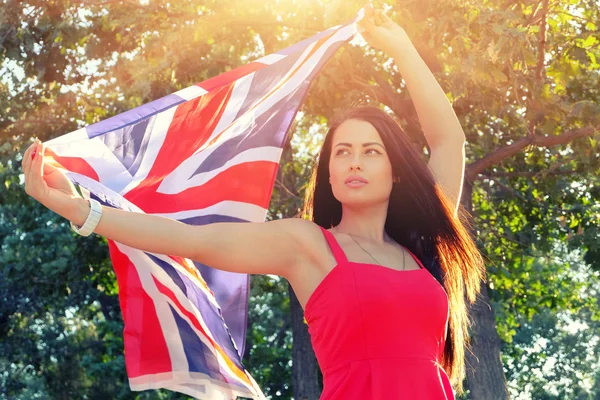 Woman  holding UK flag