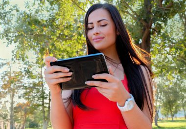 Woman with tablet clipart