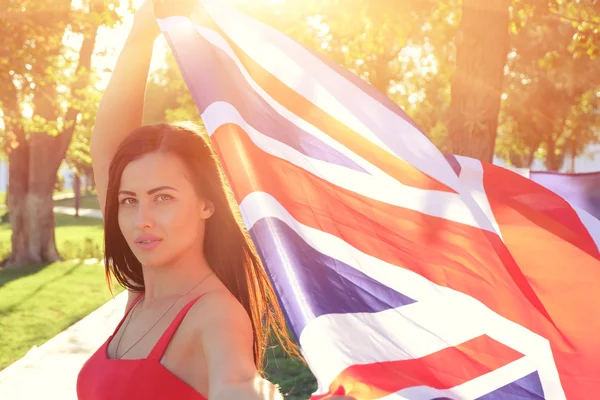 Chica con bandera del Reino Unido —  Fotos de Stock