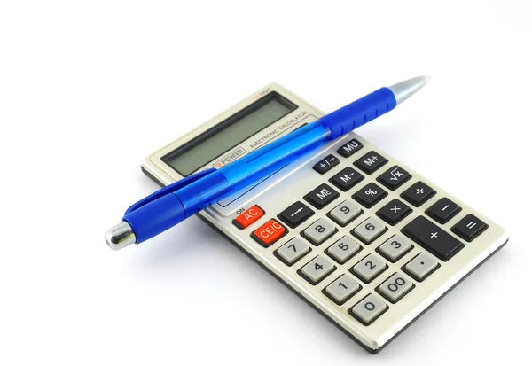Old electronic calculator and blue pen — Stock Photo, Image