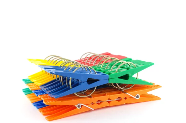 Set color clothes-pegs over white — Stock Photo, Image