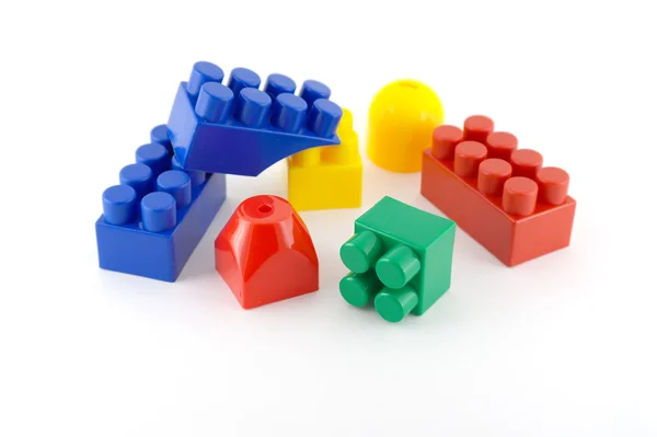 Color components of child's meccano over white — Stock Photo, Image