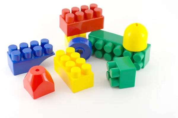 Color components of child's meccano over white — Stock Photo, Image