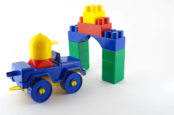 Coche azul - juguete de plástico mecánico puerta de juguete de color frontal —  Fotos de Stock