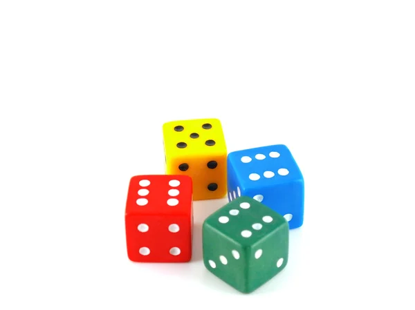 Four color dice over white — Stock Photo, Image