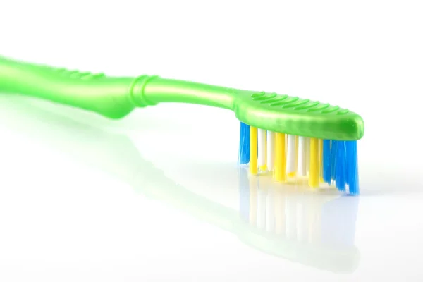 Brosse à dents sur blanc — Photo