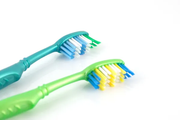 Two tooth-brushes over white — Stock Photo, Image