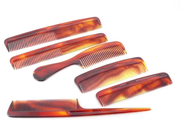 Set of plastic combs over white — Stock Photo, Image