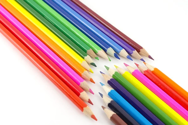 Багатокольорові олівці над білим — стокове фото
