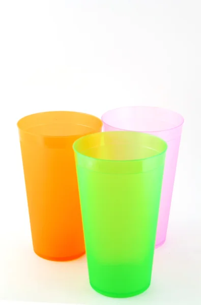 Green, orange and pink cups — Stock Photo, Image