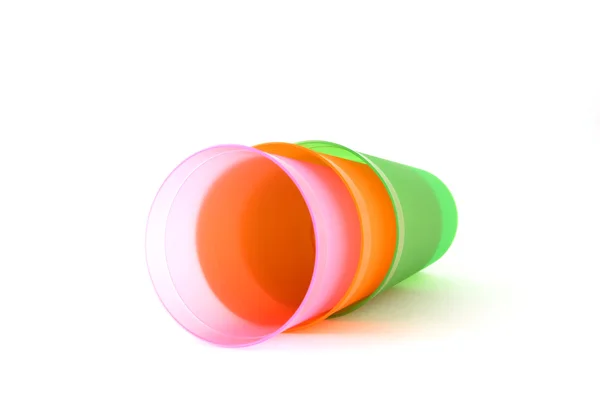 Green, orange and pink cups — Stock Photo, Image