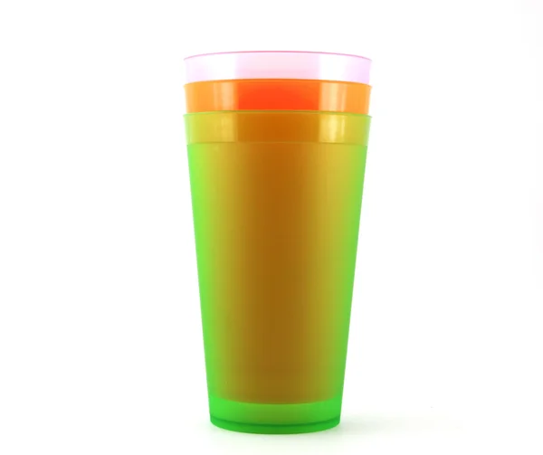 Green, orange and pink cups — Stock Photo, Image