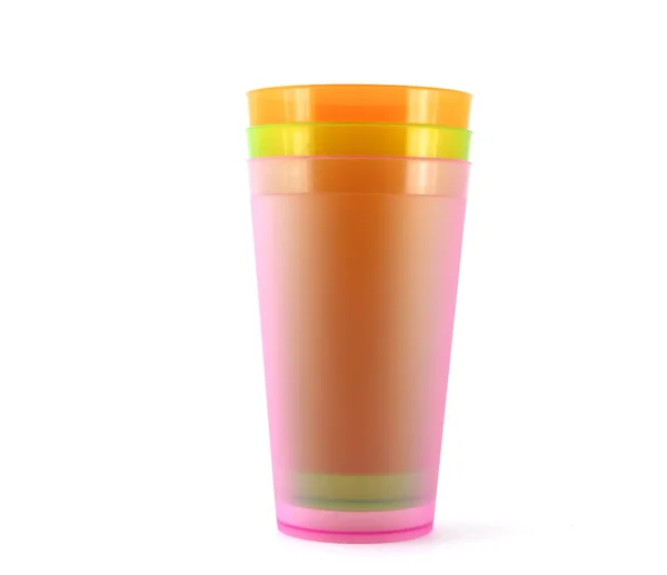 Zelené, oranžové a růžové poháry nad bílá — Stock fotografie