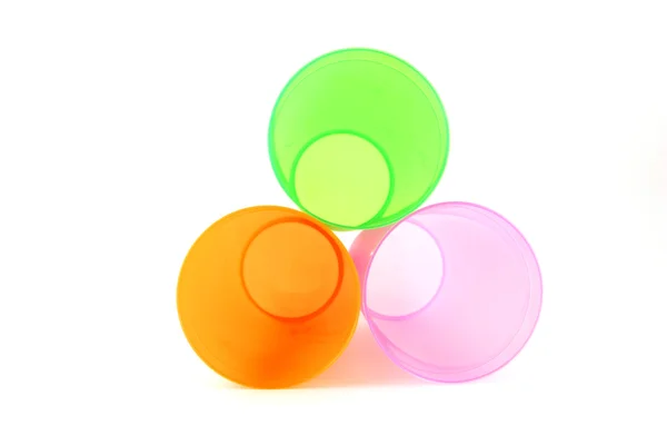 Green, orange and pink cups — Stock Photo, Image