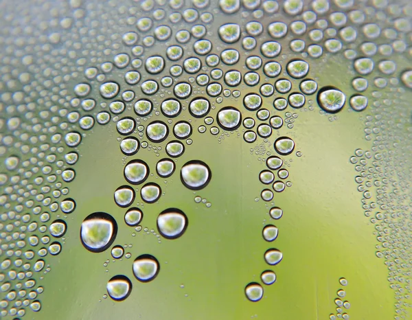 Drops of water on the crooked glass — Stock Photo, Image