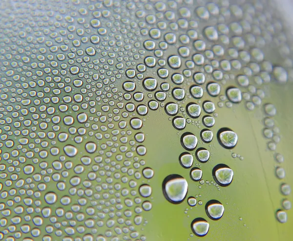 Drops of water on the crooked glass — Stock Photo, Image