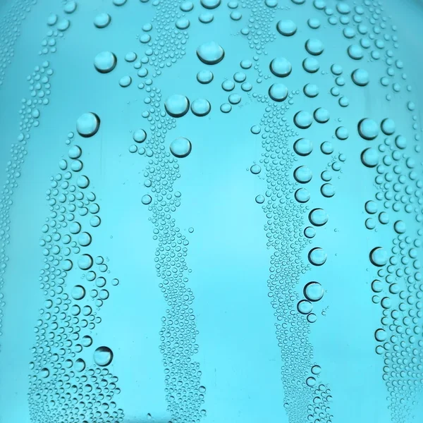 Drops of water on the crooked glass — Stock Photo, Image