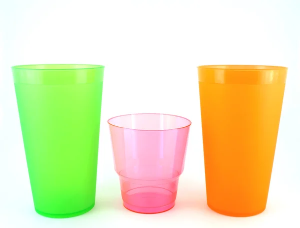 Green, orange and pink cups — Stock Photo, Image