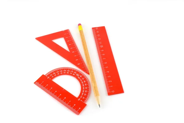 Triangle, protractor, ruler and pencil — Stock Photo, Image