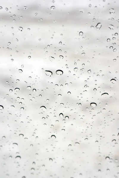 Σταγόνες της βροχής στο παράθυρο το χειμώνα — Φωτογραφία Αρχείου