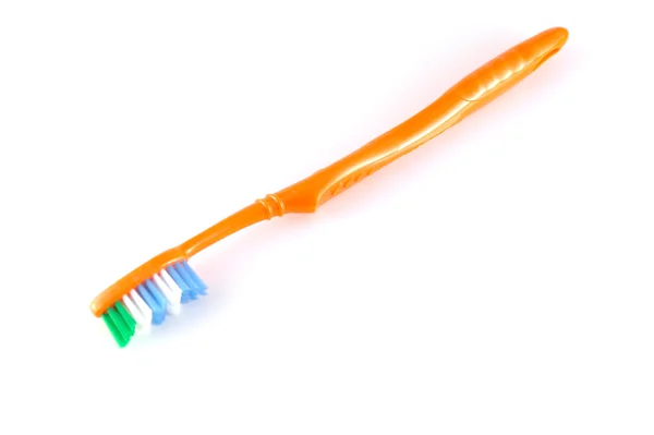 Оранжевая зубная щетка Стоковое Изображение