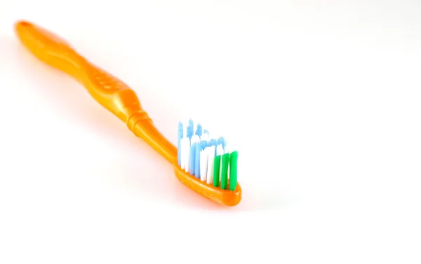 Orange toothbrush — Stock Photo, Image