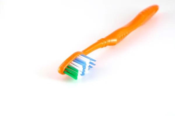 オレンジ色の歯ブラシ — ストック写真