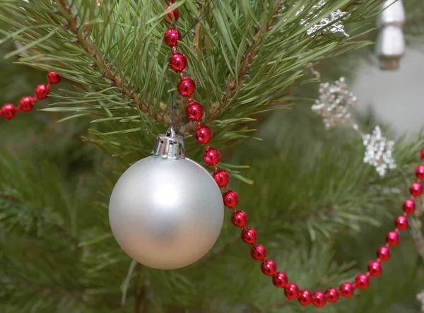 Christmas decorations on the twigs of pine — Stock Photo, Image