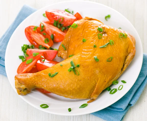 Chicken leg and tomato — Stock Photo, Image