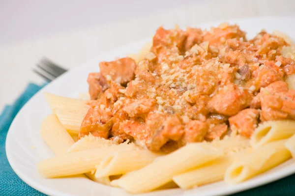 Pasta penne with salmon — Stock Photo, Image