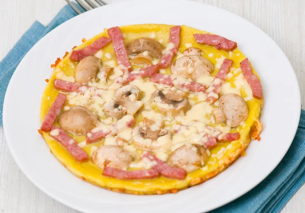 Omelet with mushrooms, ham and cheese — Stock Photo, Image